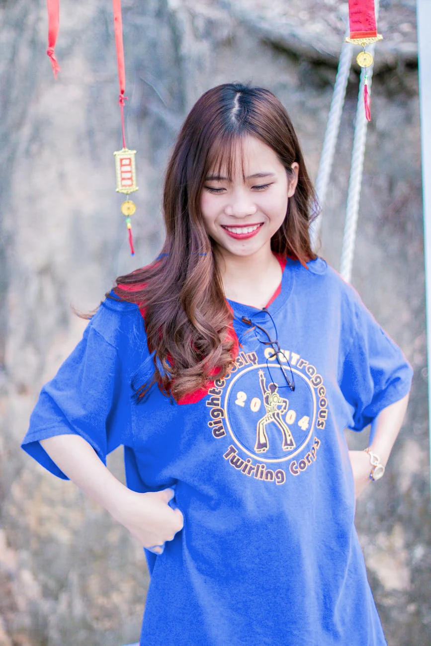 Recolored Red shirt recolored blue while the surrounding photo is protected
